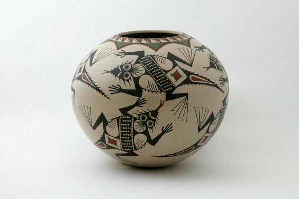 Artist:                       Roberto Banuelos\nHeight:                    7  1/8"\nDiameter:                8   7/16"\nCircumference:        7  1/8"\nPrice:                      $600